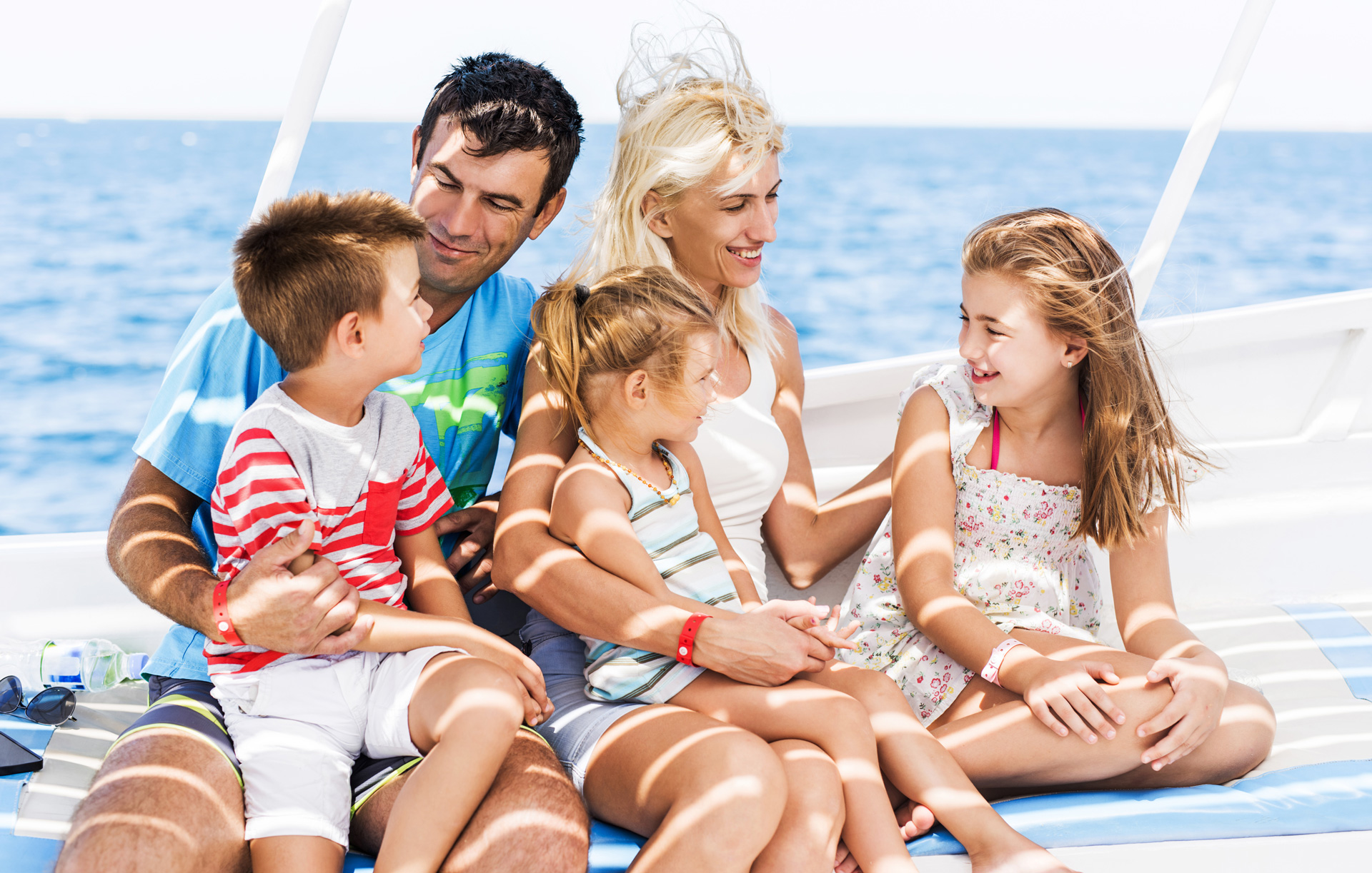 Happy family enjoying time on the water